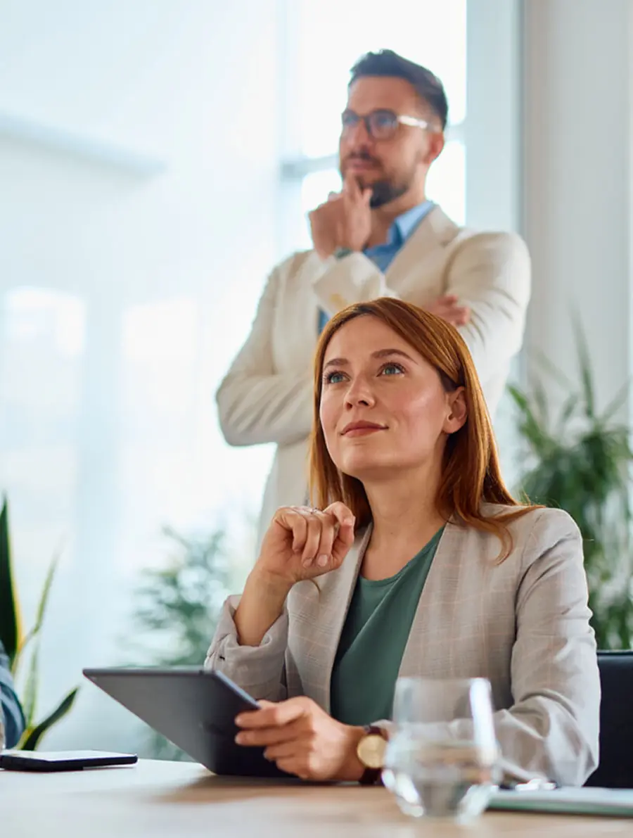 Two commercial leaders following a presentation